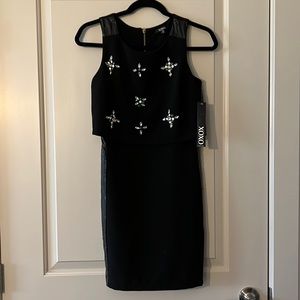 Black dress with gem details.